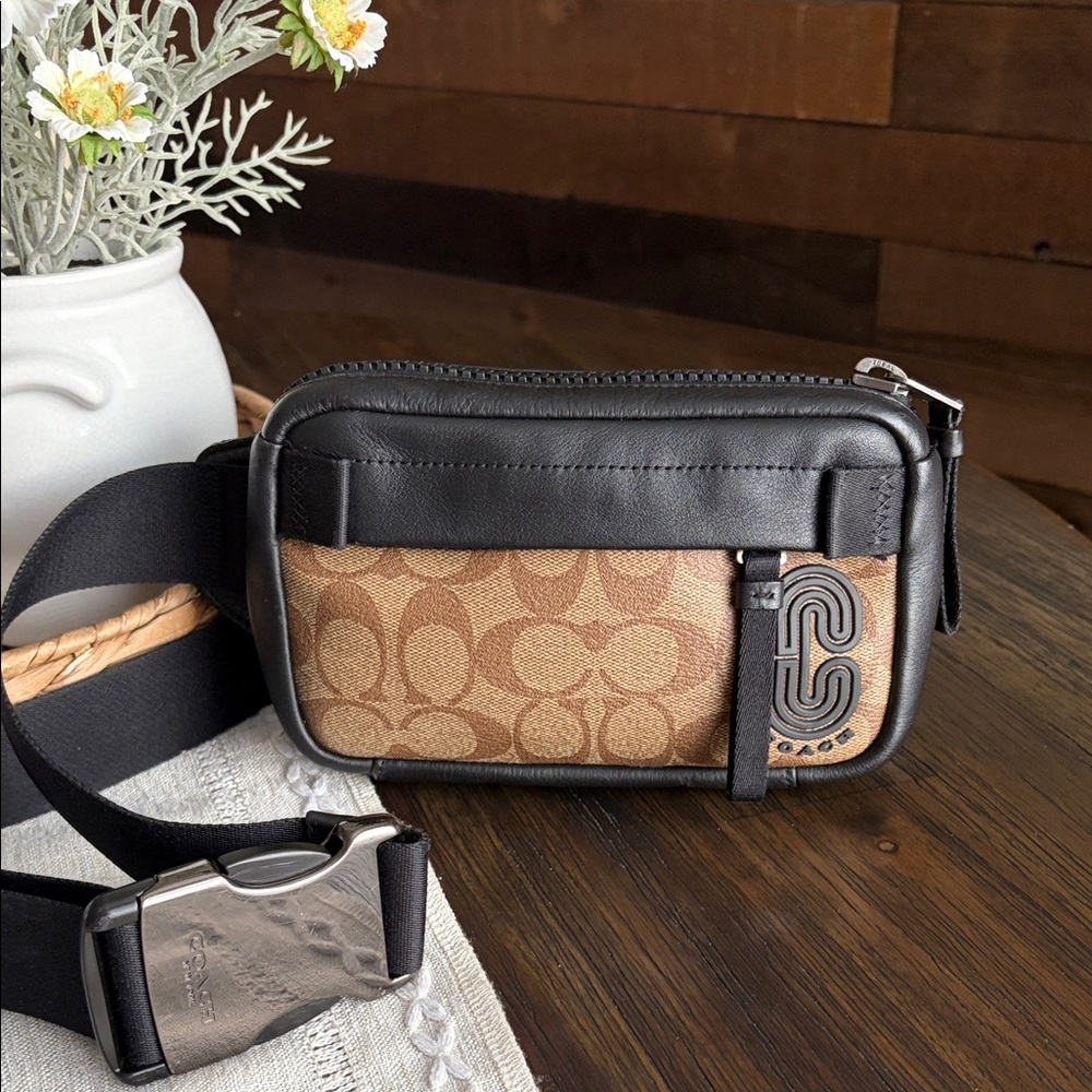 Coach Edge Belt Bag in signature coated canvas.